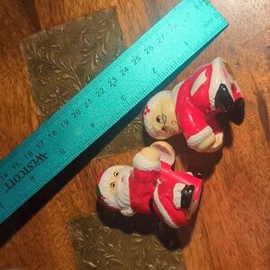 Vintage ceramic Santa and Mrs Claus candle climbers